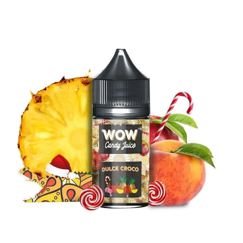 Flacon d'arôme concentré Dulce Croco 30ml Wow Candy Juice entouré d'ananas, de brugnon et de bonbons colorés.