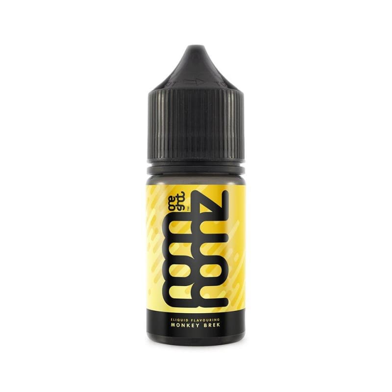 Flacon de 30ml d'arôme concentré Nom Nomz Monkey Brek avec étiquette jaune, bouchon noir et logo stylisé.