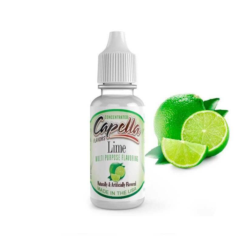 Flacon de 10ml d'arôme concentré Capella Lime avec étiquette blanche et citrons verts frais en arrière-plan.