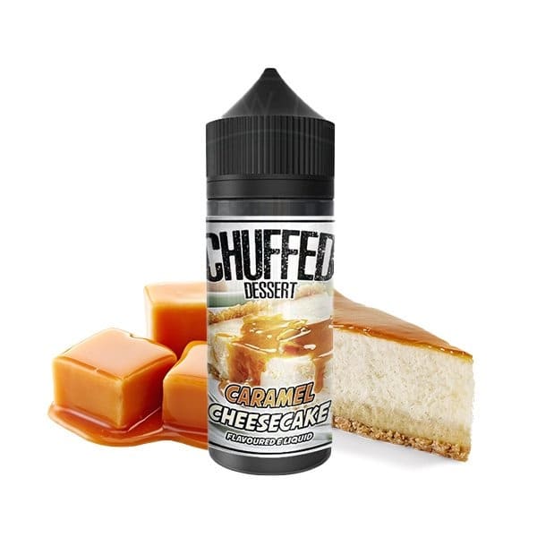 Flacon de 100ml Chuffed Caramel Cheesecake avec bouchon noir, entouré de morceaux de caramel et d'une part de cheesecake.