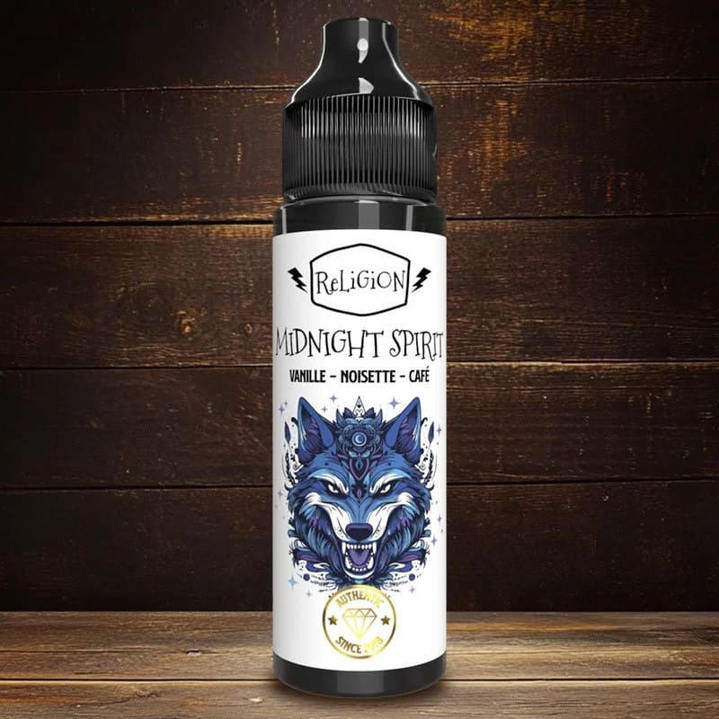 Flacon 50ml Midnight Spirit Religion Juice avec étiquette illustrée d'un loup bleu sur fond de bois sombre.