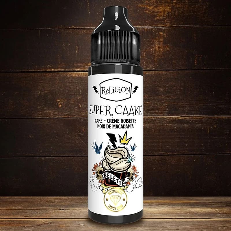 Flacon de 50ml Super Caake Religion Juice avec étiquette illustrée sur fond de bois sombre.
