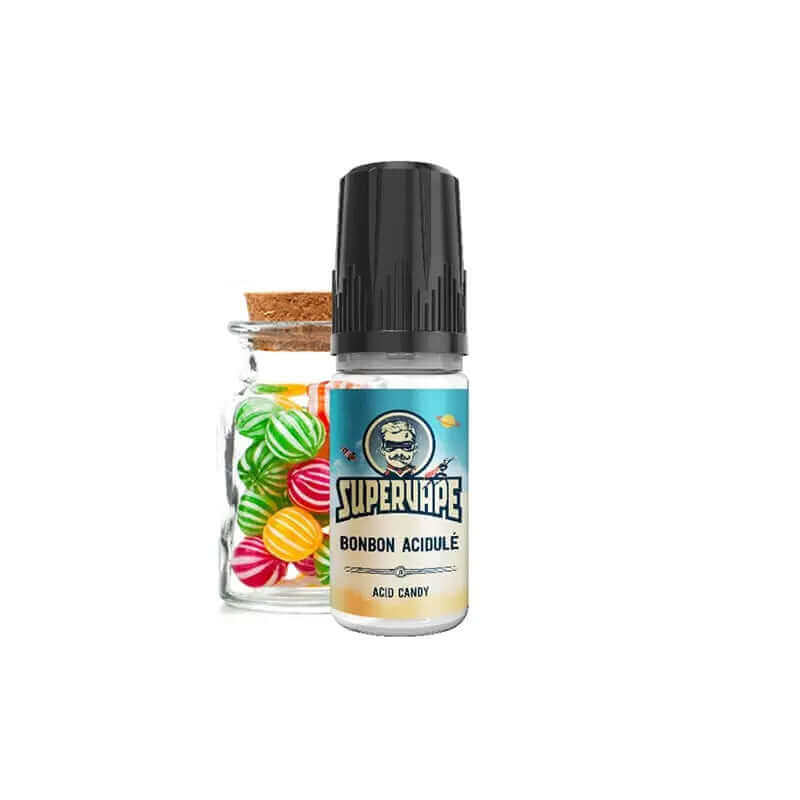 Flacon de 10ml d'arôme Supervape Bonbon Acidulé avec étiquette bleue devant un bocal en verre rempli de bonbons colorés.