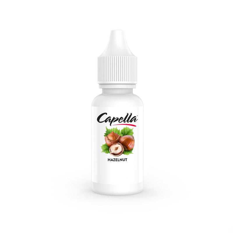 Flacon de 10ml d'arôme concentré Capella Hazelnut V2 avec étiquette blanche illustrée de noisettes.