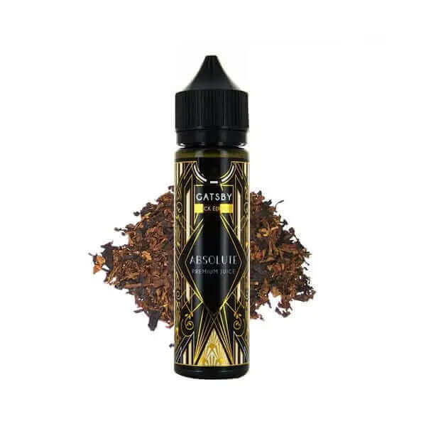 Flacon de 50ml Gatsby Absolute avec étiquette noire et dorée style Art Déco devant un tas de feuilles de tabac séchées.