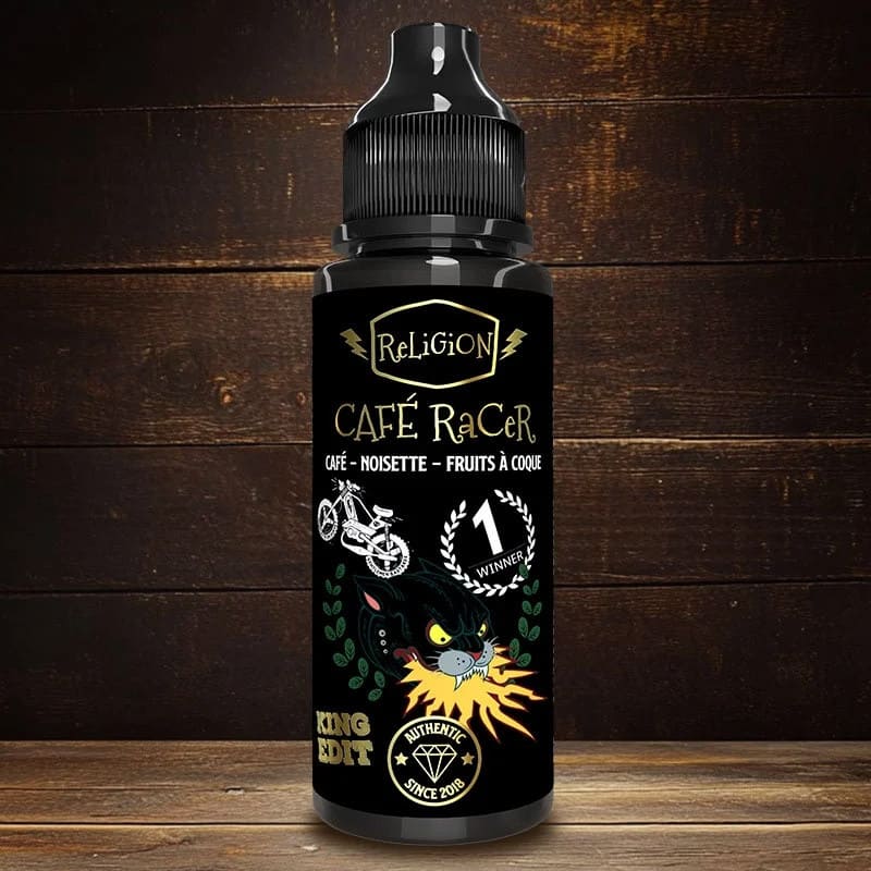 Flacon 100ml d'e-liquide Café Racer Religion Juice avec étiquette noire, illustration de panthère et détails dorés sur fond bois.