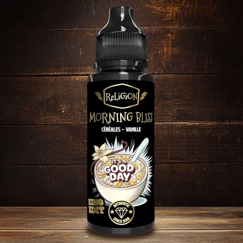 Flacon de 100ml Religion Juice Morning Bliss avec étiquette noire illustrée d'un bol de céréales et vanille sur fond bois.